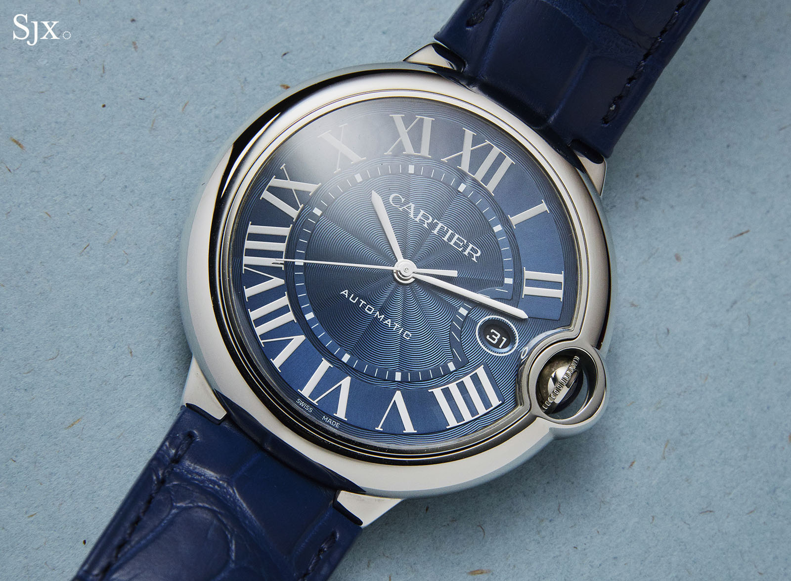 cartier watch with blue hands